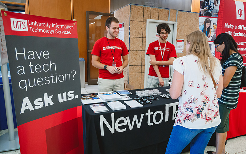 UITS staff tabling at an outreach event on IU Bloomington campus