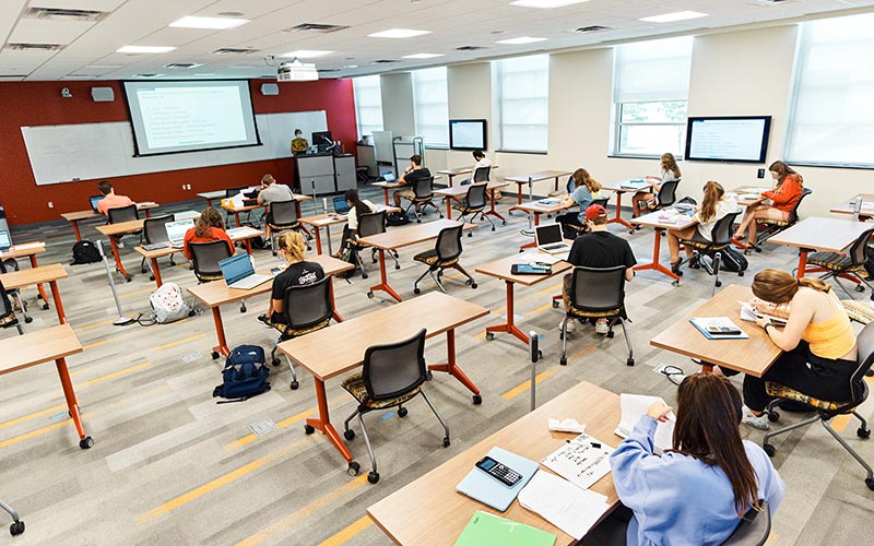Image of a classroom with class in session.